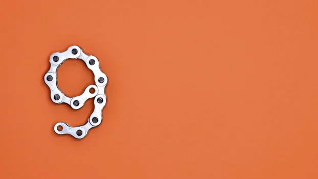 The number 9 on an orange background