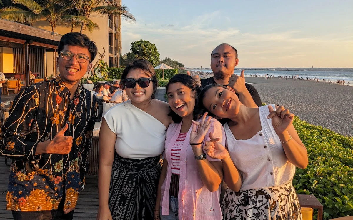 Luminary team members at beach party